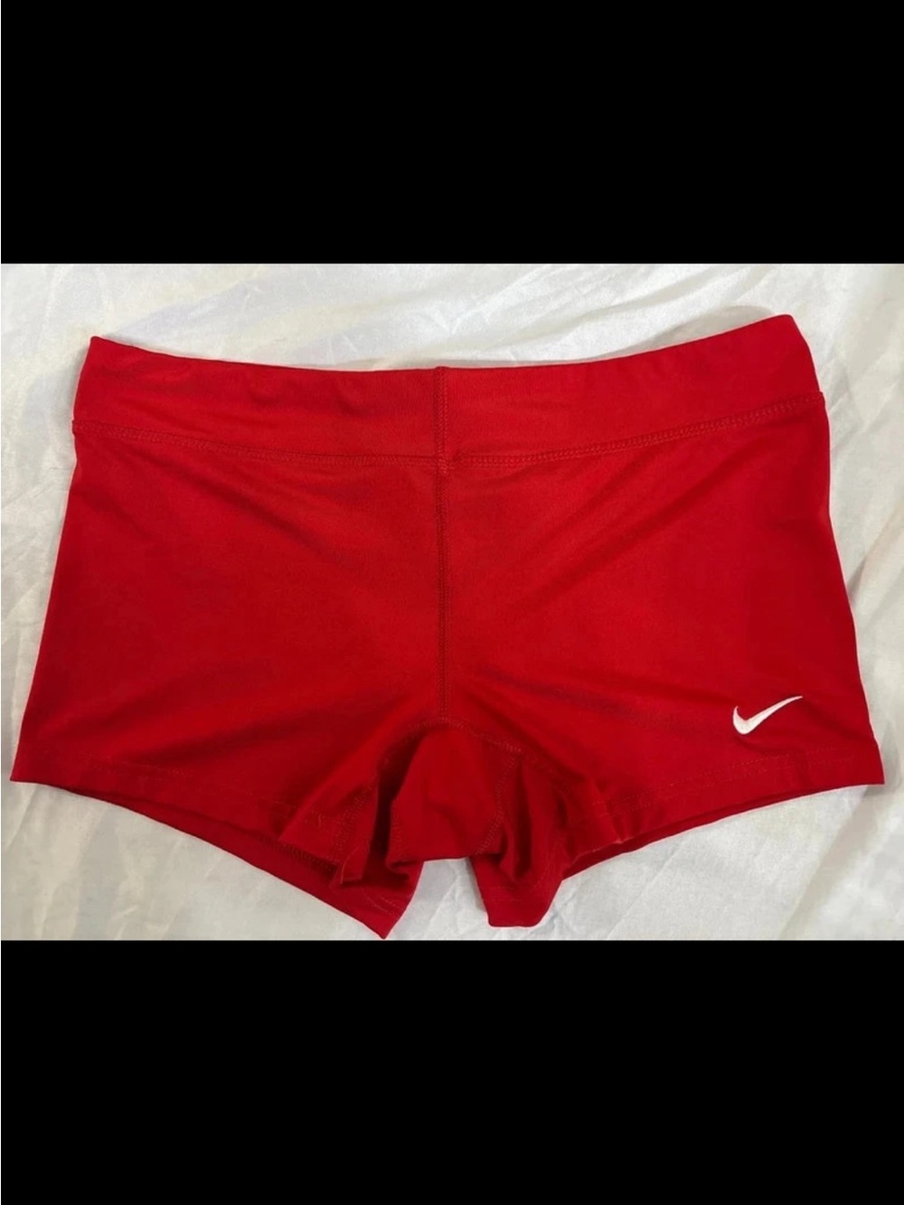 Nike Women’s Red Performance Booty Shorts with White Swoosh
